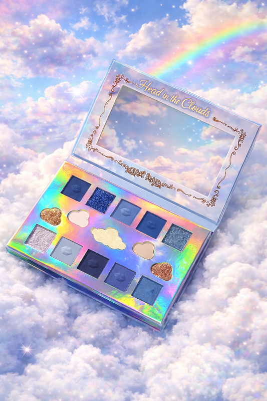 Makeup palette with cloud and rainbow design on a cloud background