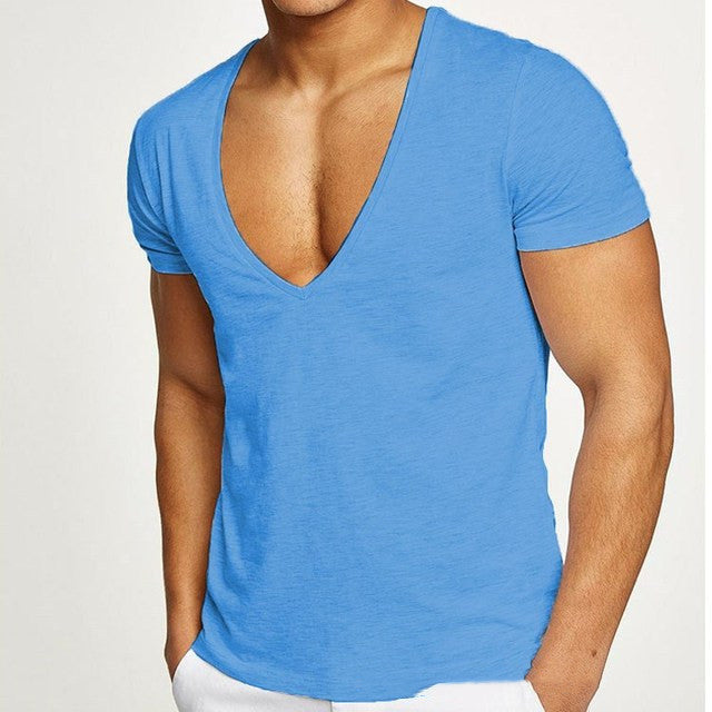 Blue t-shirt with a deep neckline worn by a person on a white background