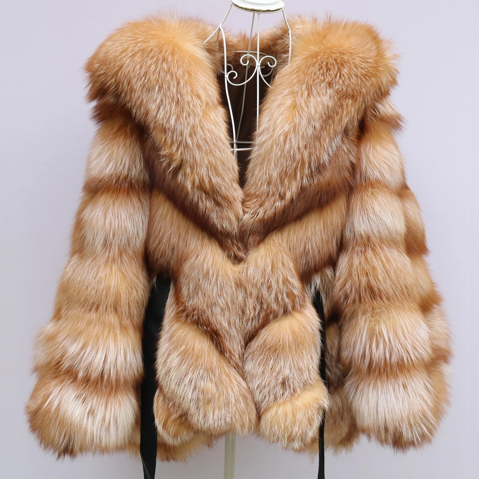 Beige fur coat on a mannequin against a light gray background. Natural Golden Fox Fur Coat with Batwing Sleeve & Double-Sided