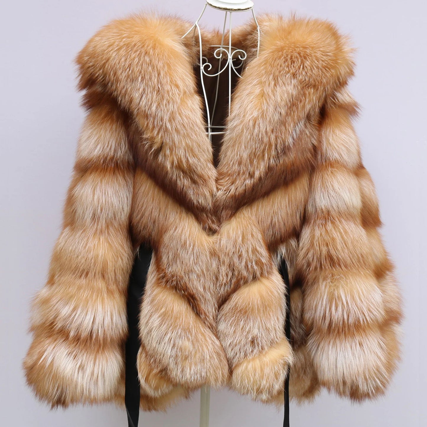 Beige fur coat on a mannequin against a light gray background. Natural Golden Fox Fur Coat with Batwing Sleeve & Double-Sided