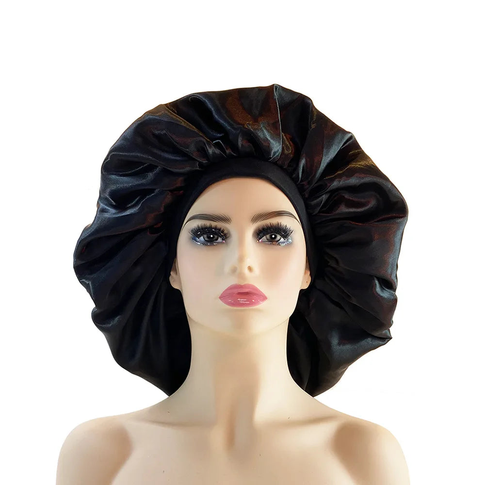 Black satin bonnet on a mannequin head against a white background
