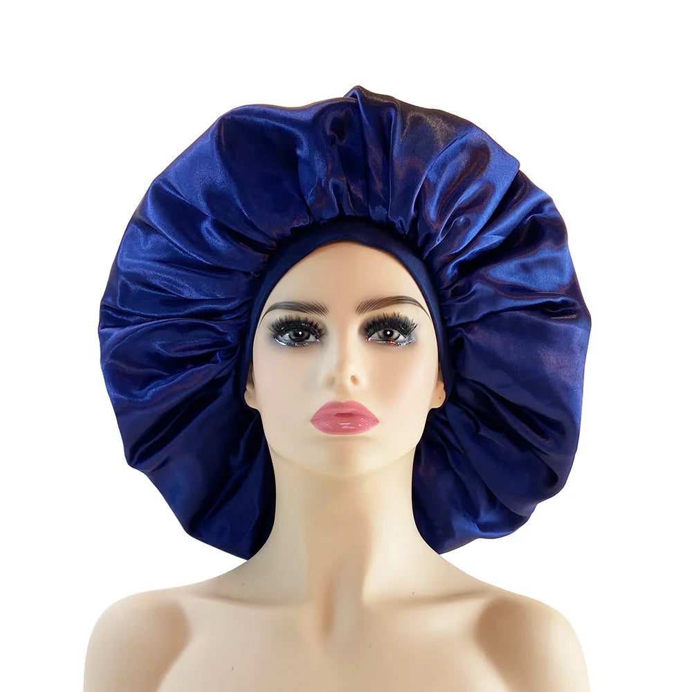 Blue satin bonnet on a mannequin head against a white background