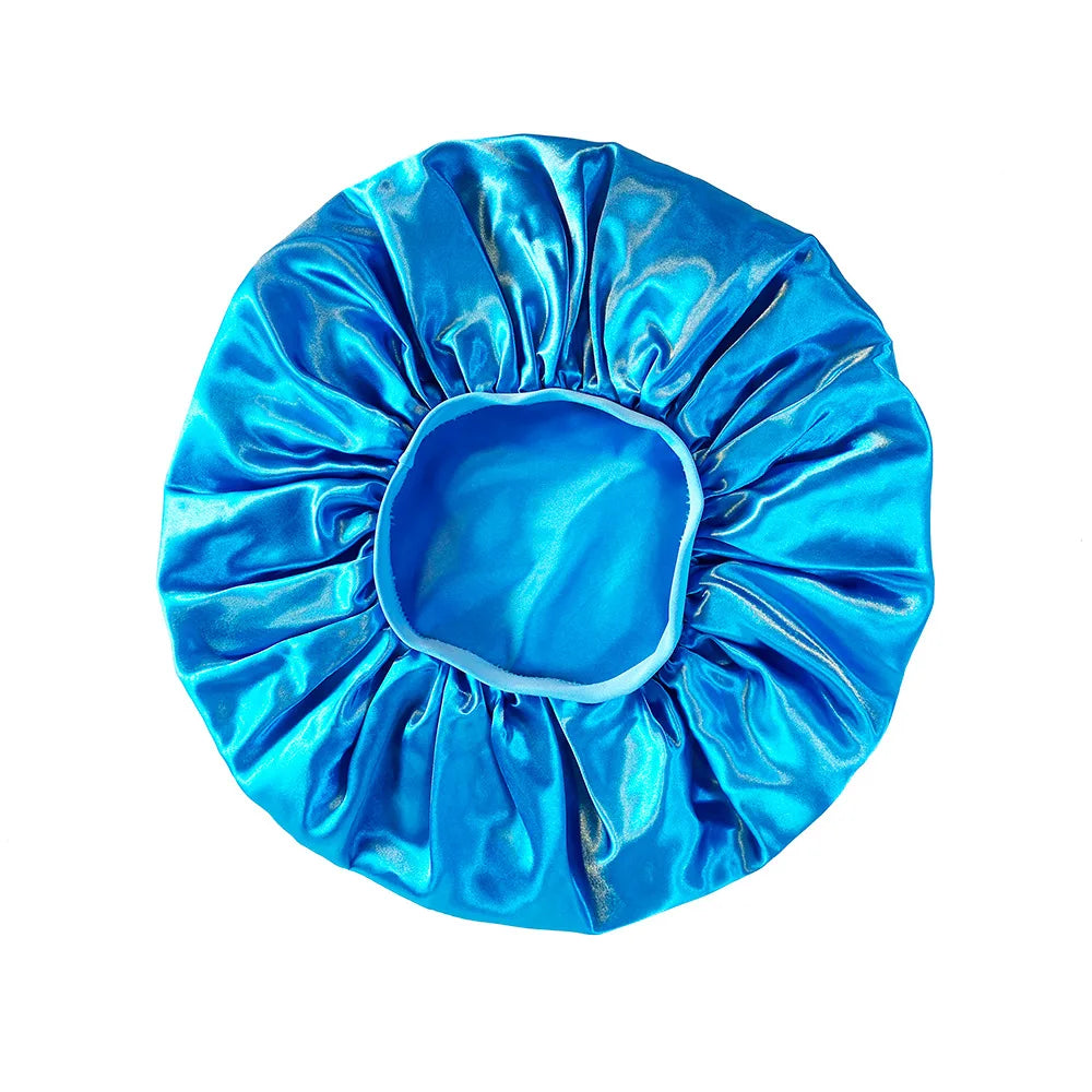 Blue satin hair bonnet on a white background