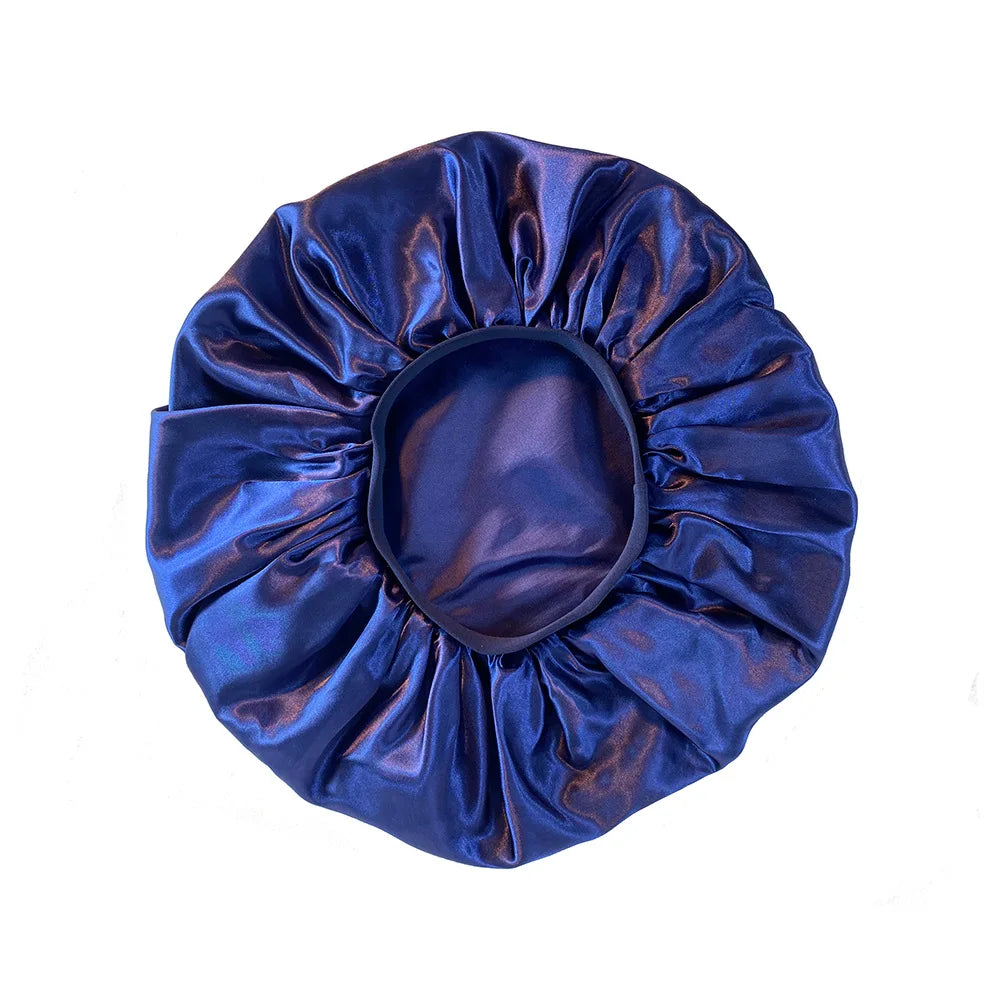 Blue satin hair bonnet on a white background