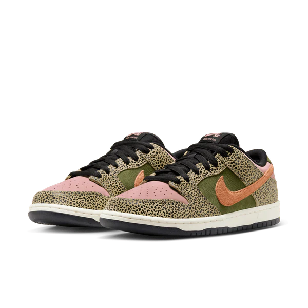 A pair of Nike Dunk Low sneakers featuring a green and black leopard print pattern, light pink perforated toe boxes, and a peach-colored Swoosh on a white background.