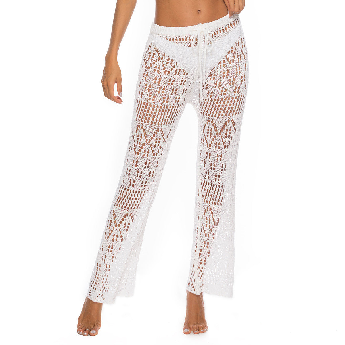 Solid color sexy ladies nightclub sexy see-through cut-out woven anti-hiccup trousers hooked beach pants