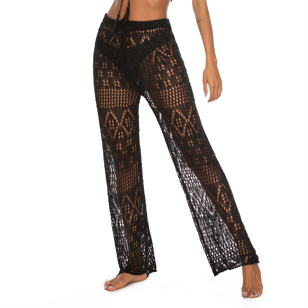 Solid color sexy ladies nightclub sexy see-through cut-out woven anti-hiccup trousers hooked beach pants