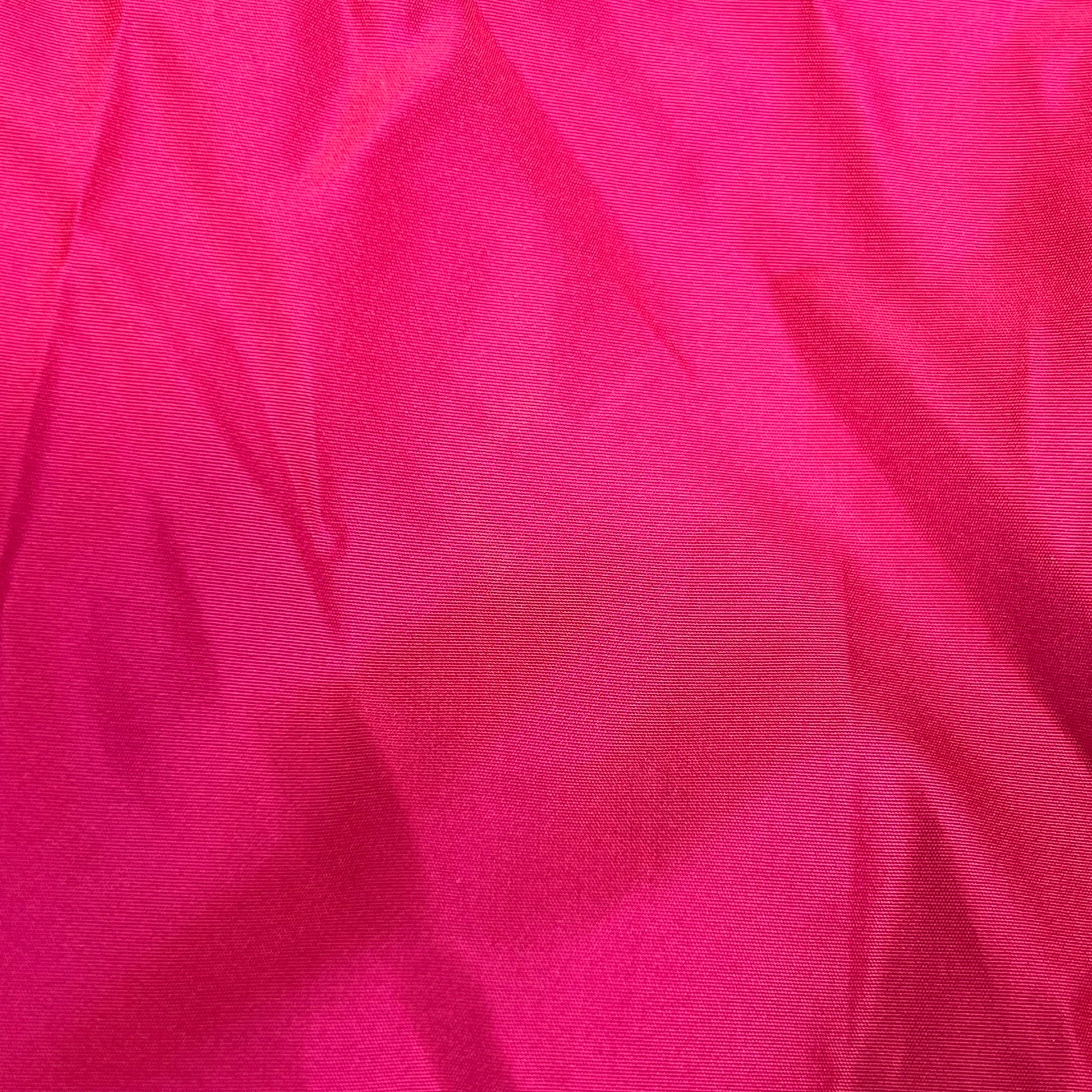 Close-up of bright pink fabric texture