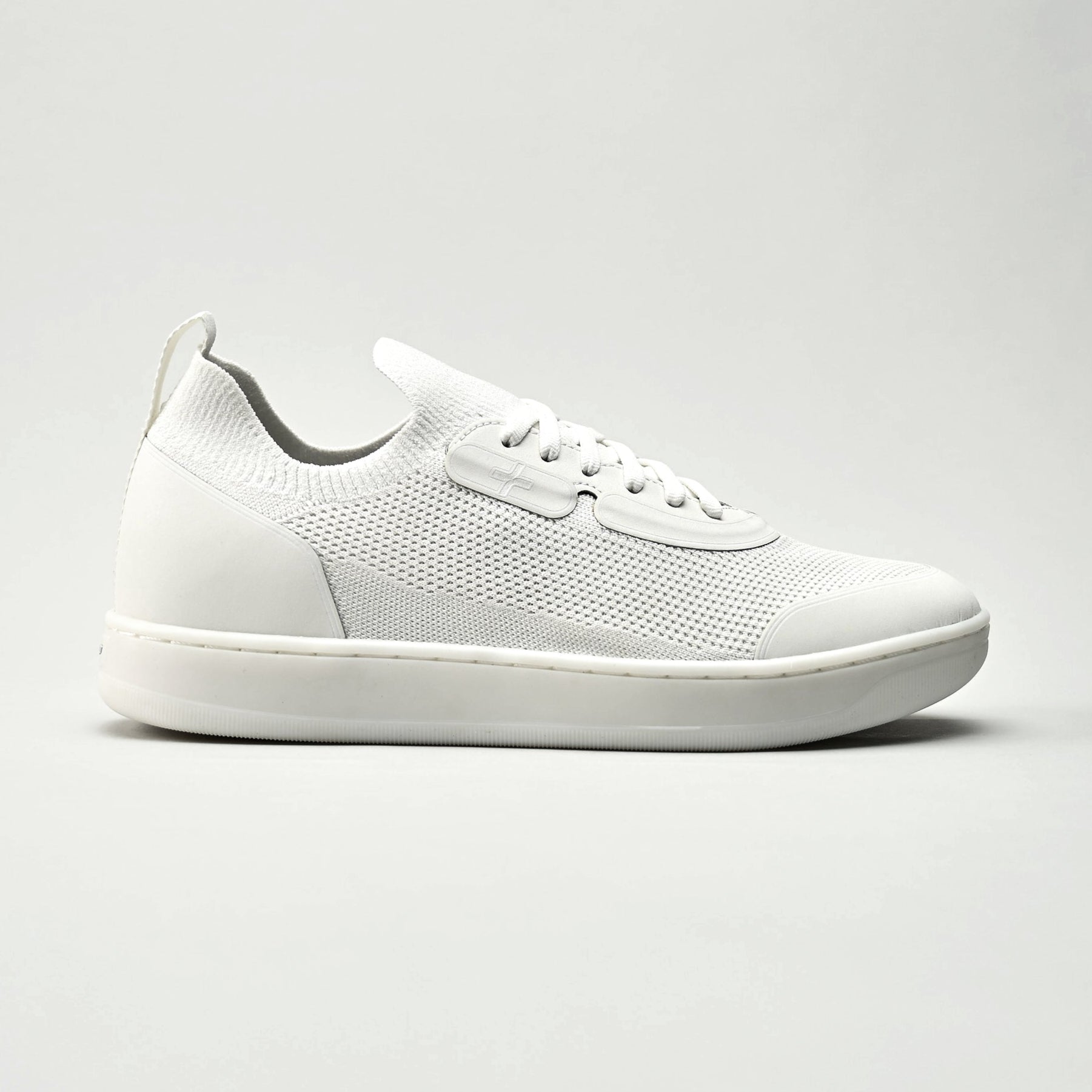 White sneaker on a light gray background