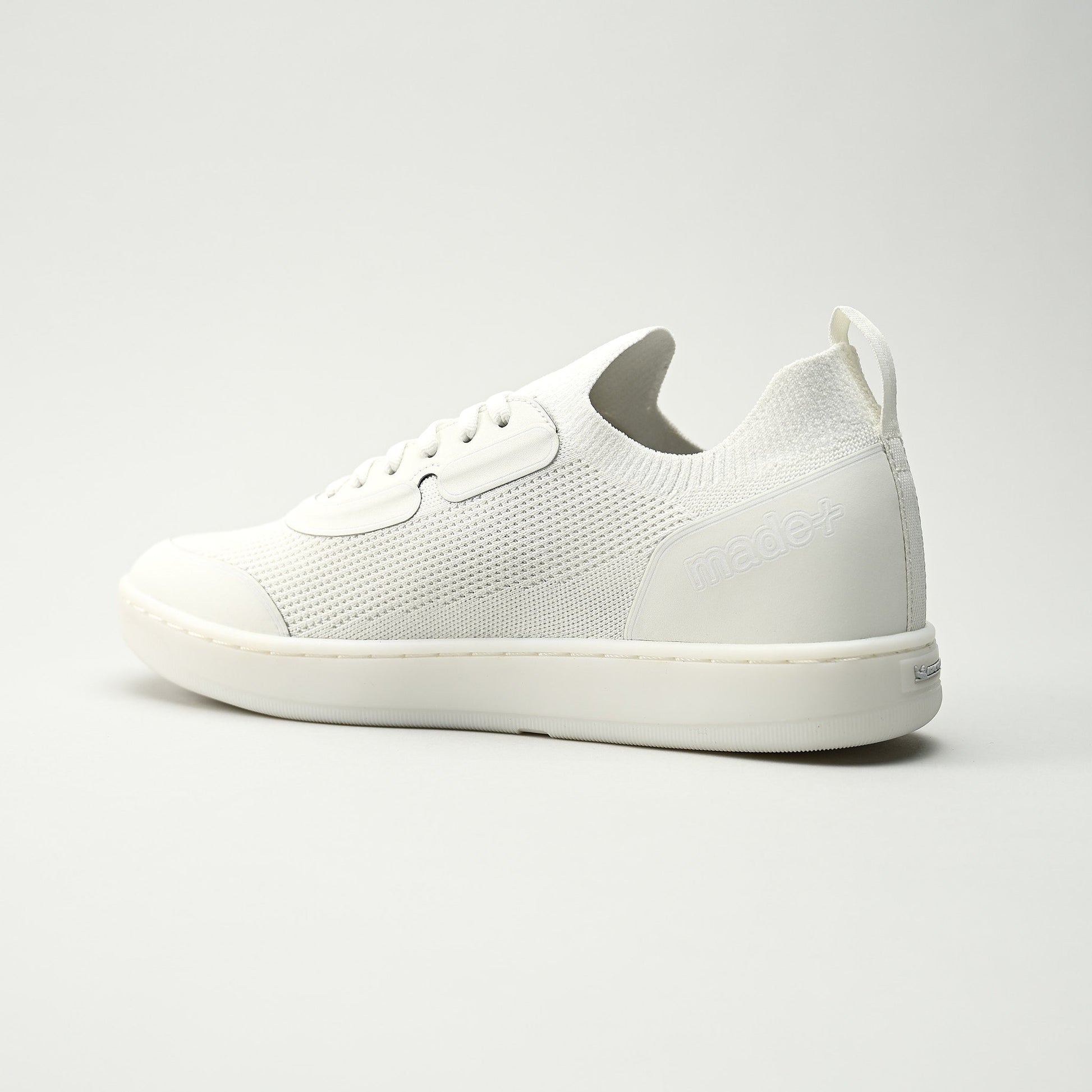 White sneaker on a light gray background