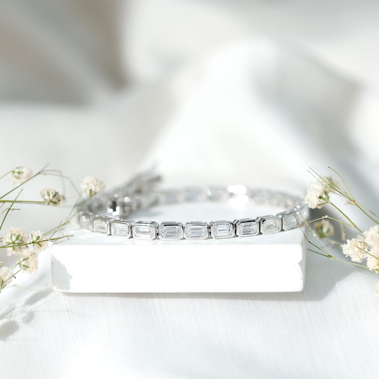 Emerald Cut 3X5 MM Lab Grown Diamond Tennis Bracelet in Bezel Setting