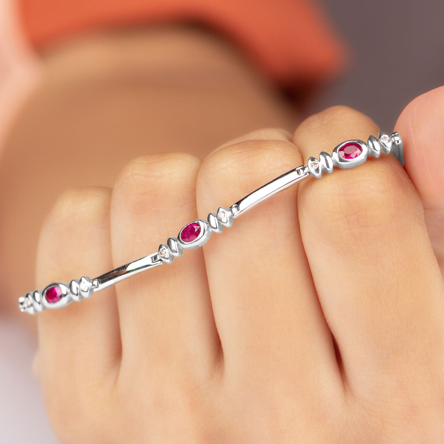Oval Lab Grown Ruby Link Bracelet with Moissanite