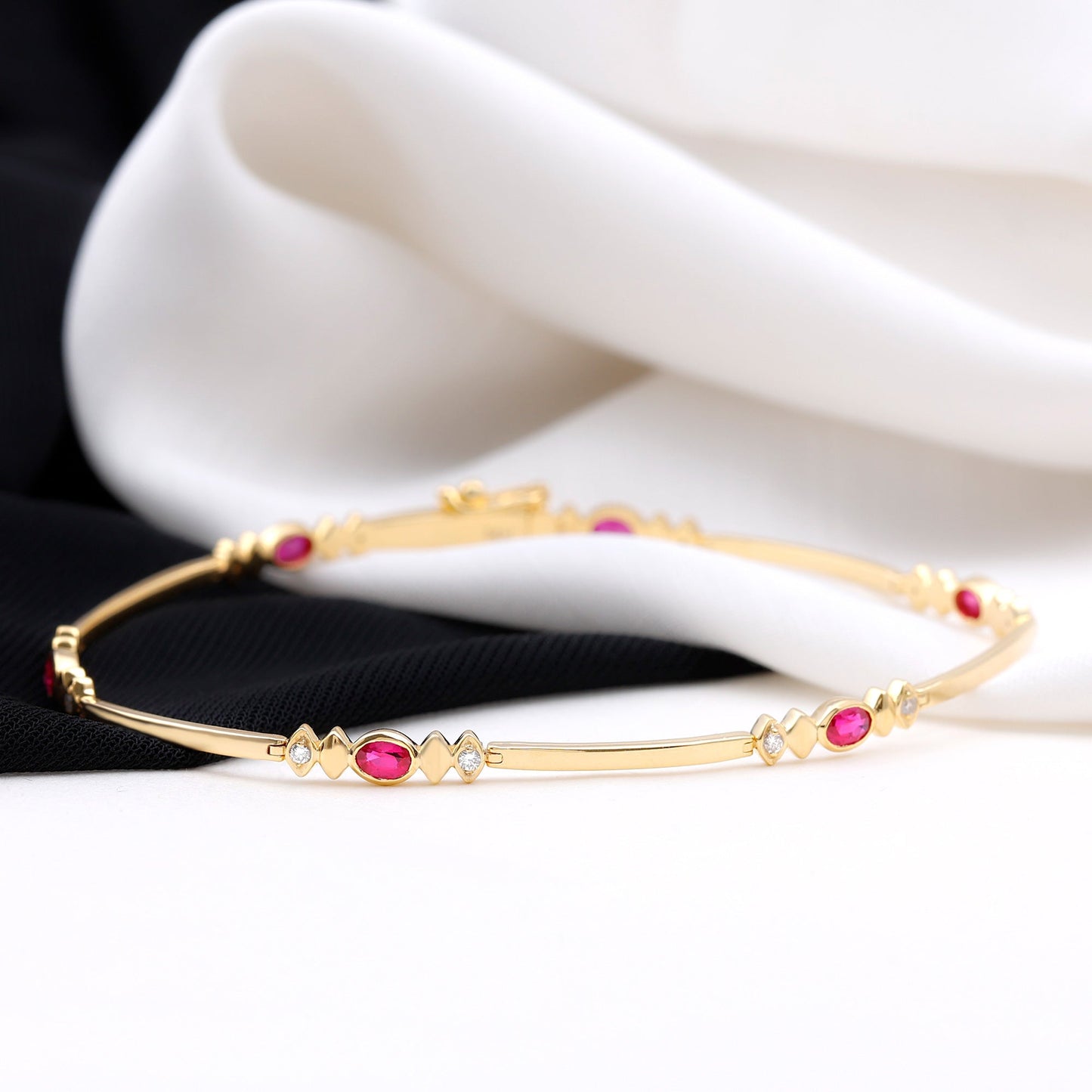 Oval Lab Grown Ruby Link Bracelet with Moissanite