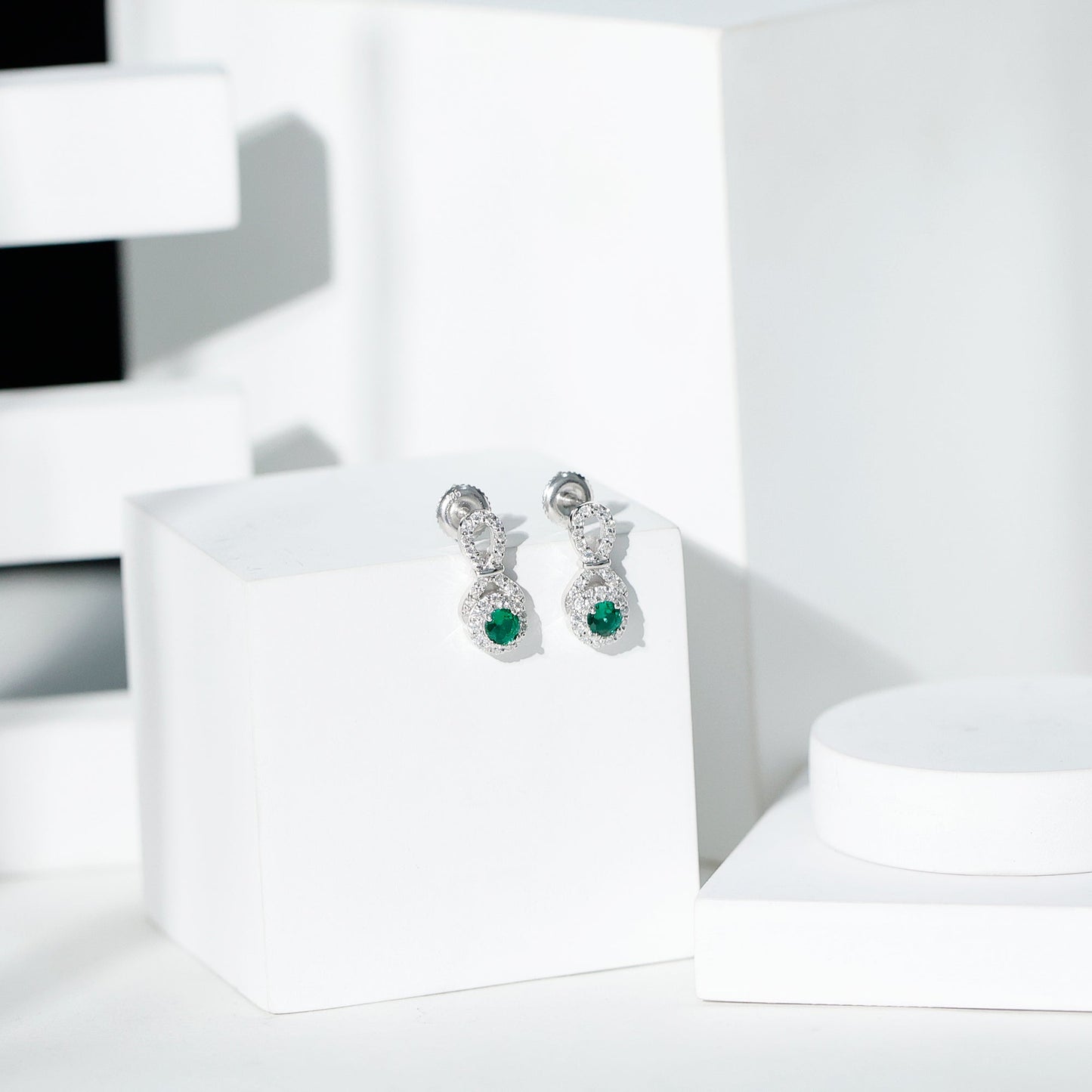 Half Carat Lab Grown Emerald Infinity Stud Earrings with Moissanite
