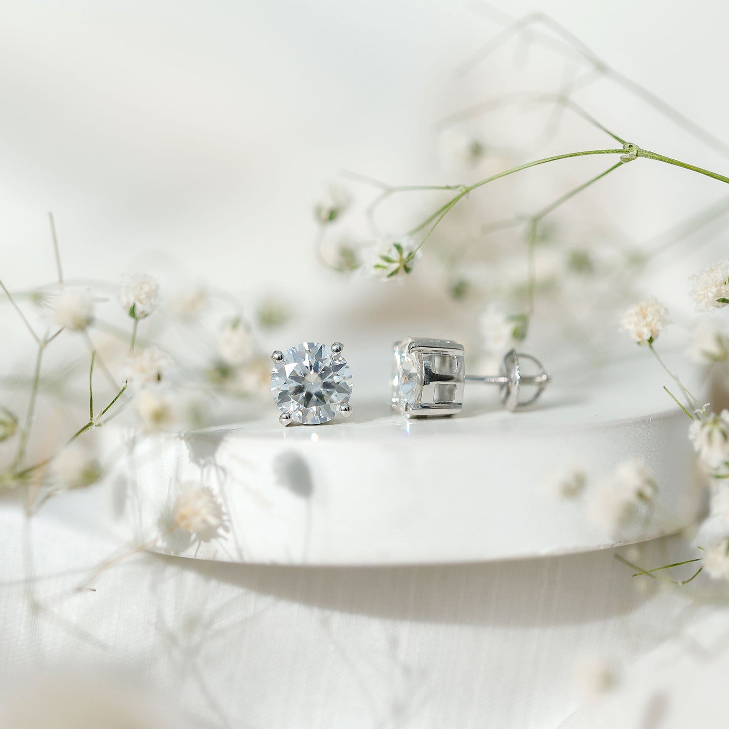 2.5 Carat Round Moissanite Studs in Claw Setting