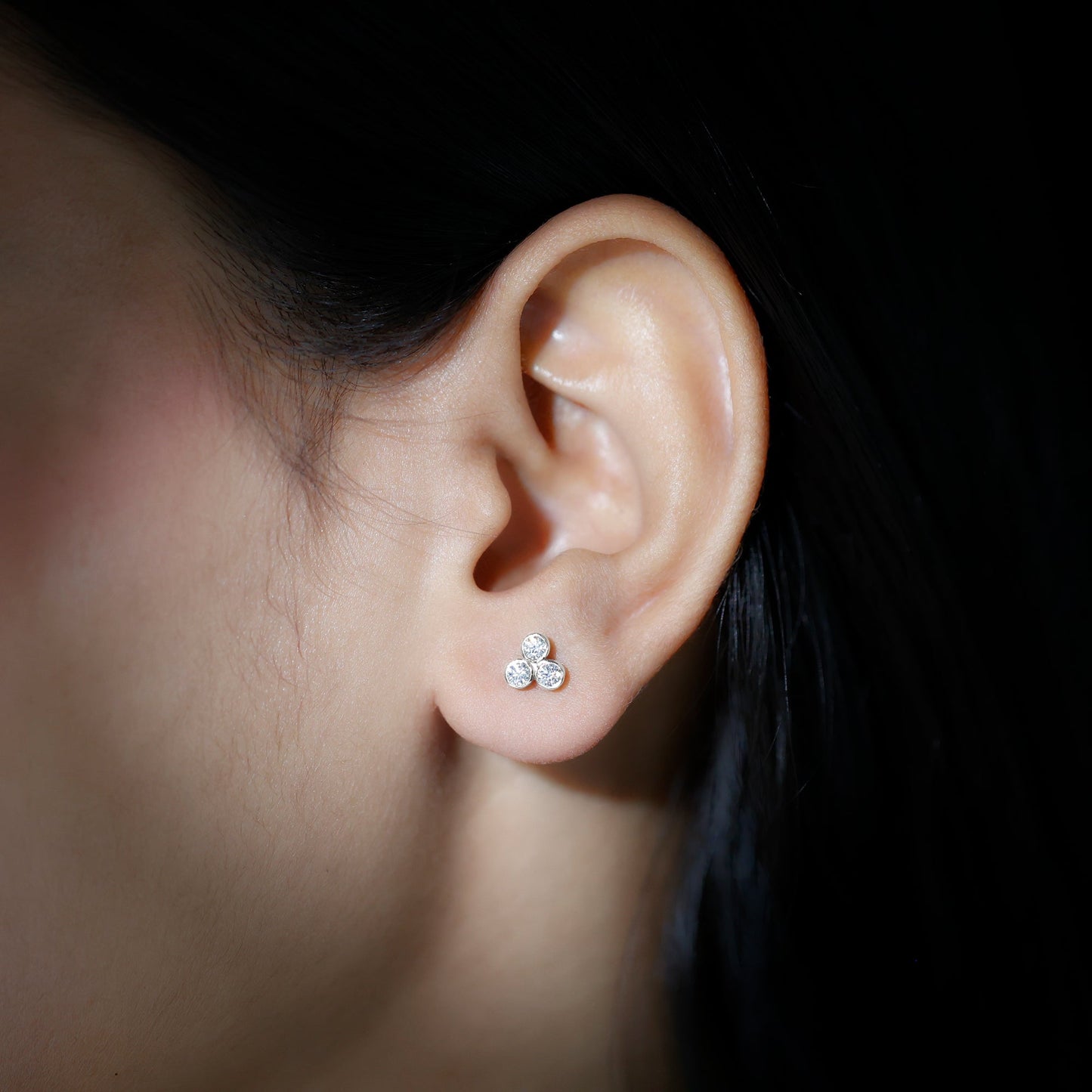 Bezel Set Round Cut Moissanite Three Stone Stud Earrings