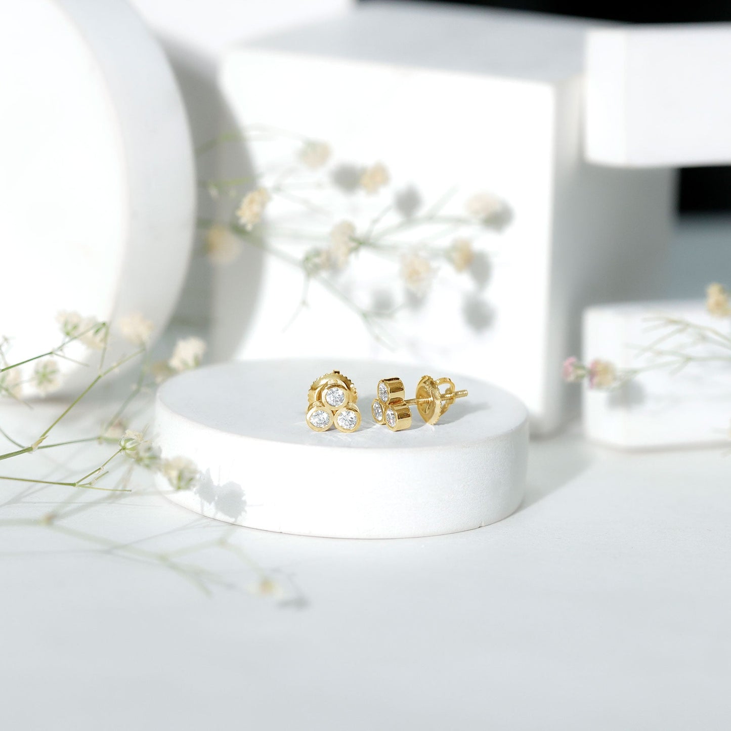 Bezel Set Round Cut Moissanite Three Stone Stud Earrings
