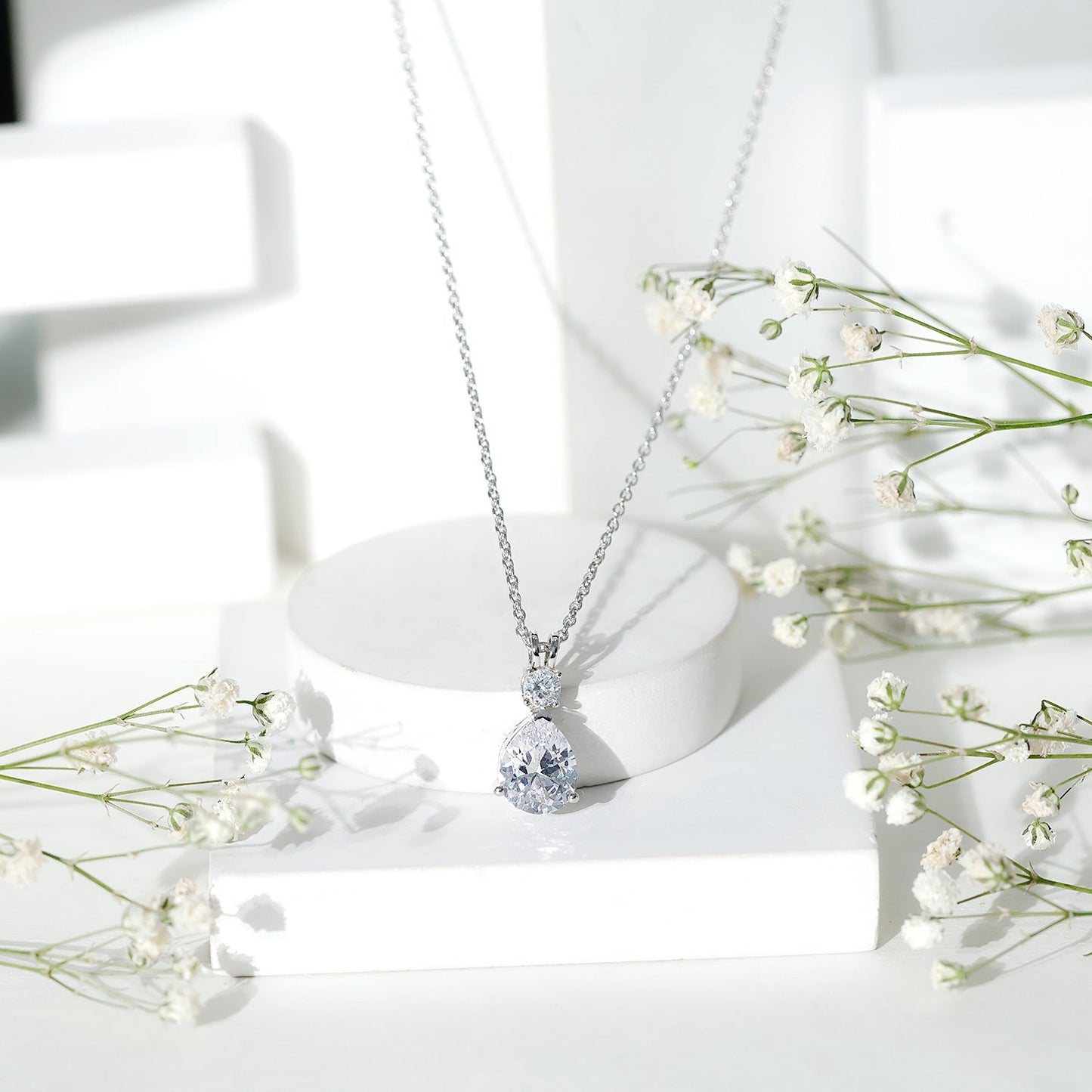 Pear and Round Shaped Zirconia Drop Pendant
