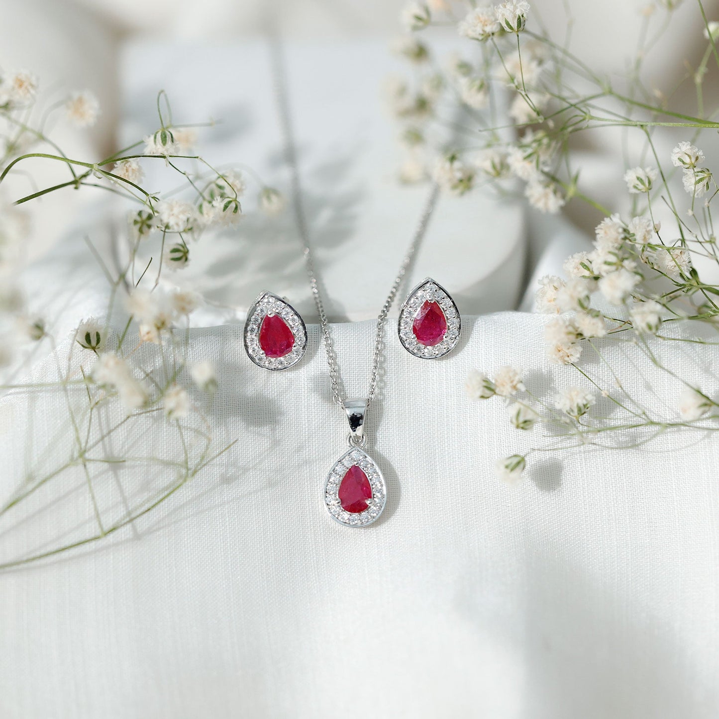 Genuine 2.6 Carat Pear Cut Ruby and Moissanite Halo Pendant and Earrings Set