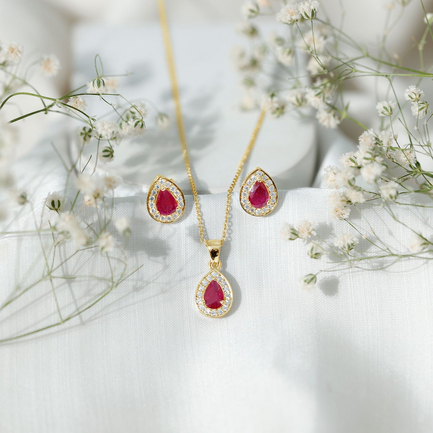 Genuine 2.6 Carat Pear Cut Ruby and Moissanite Halo Pendant and Earrings Set