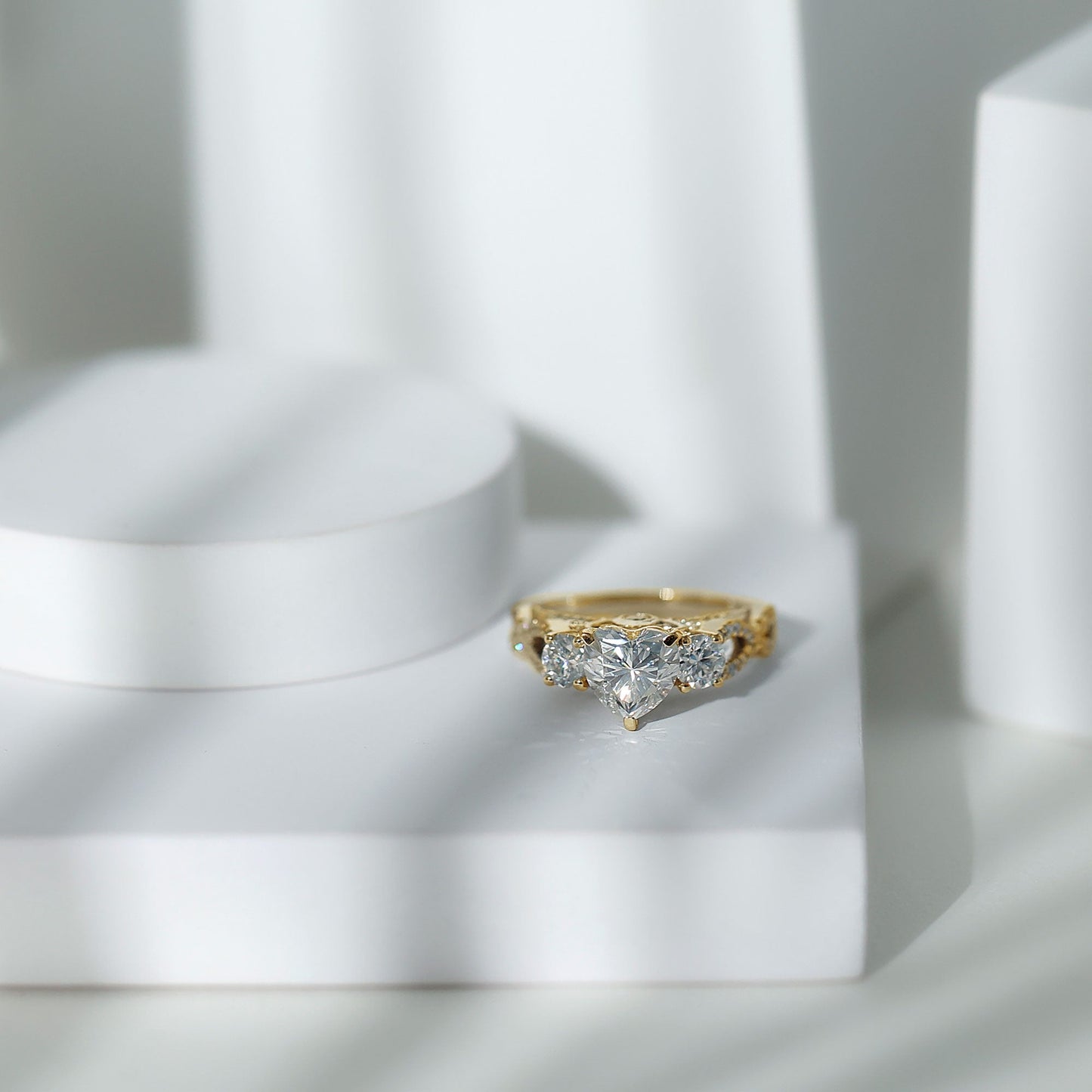 Heart Moissanite 3 Stone Engagement Ring in Crossover Band