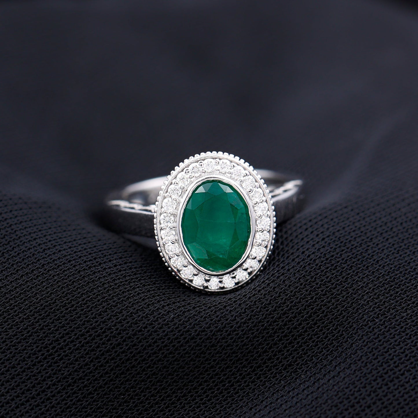 6X8 mm Oval Lab Grown Emerald Bezel Set Engagement Ring With Diamond Halo