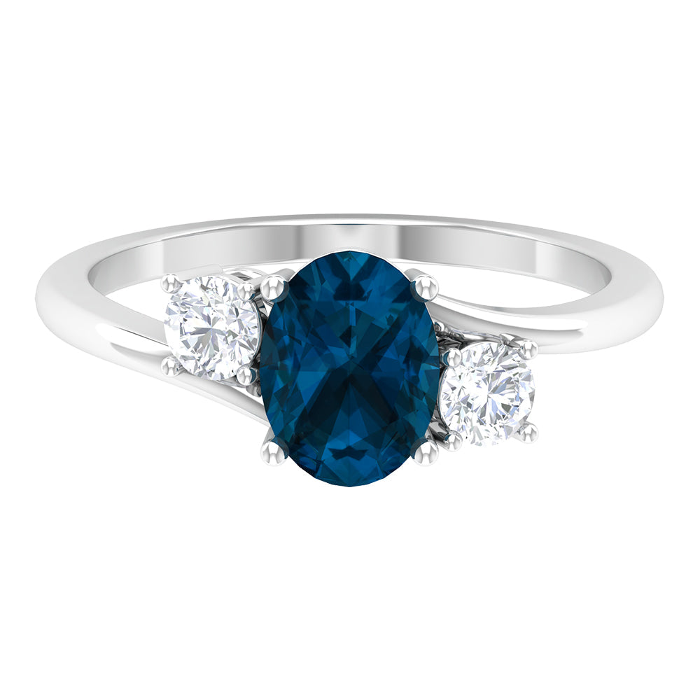 6X8mm Oval Cut London Blue Topaz Three Stone Engagement Ring with Diamond