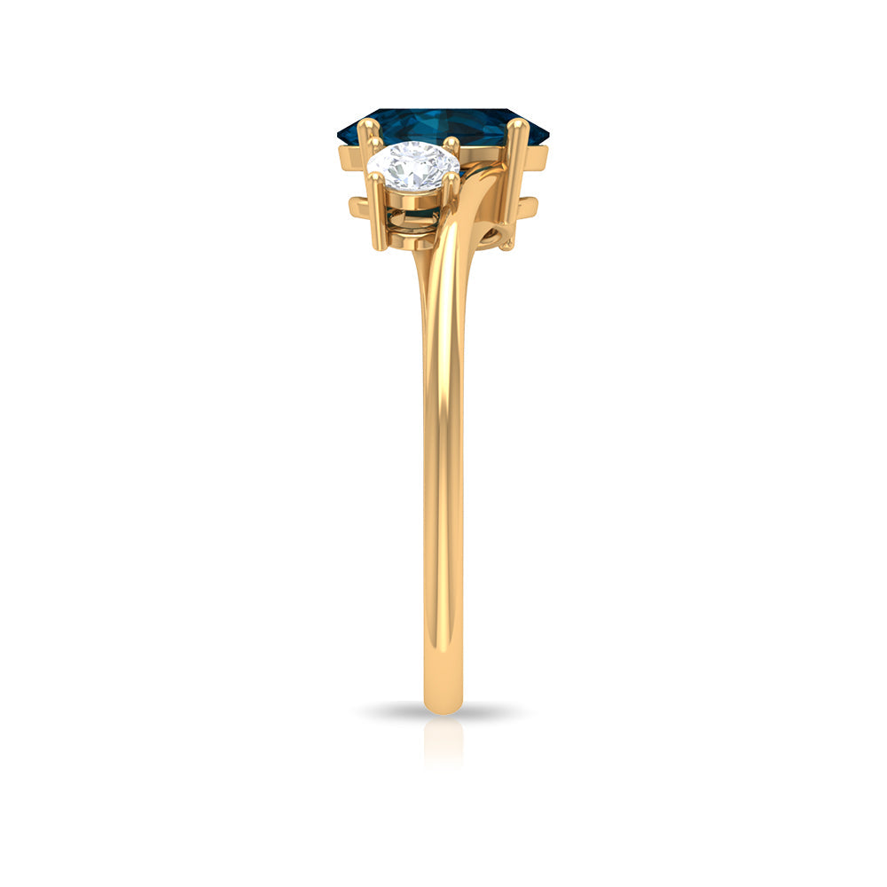 6X8mm Oval Cut London Blue Topaz Three Stone Engagement Ring with Diamond