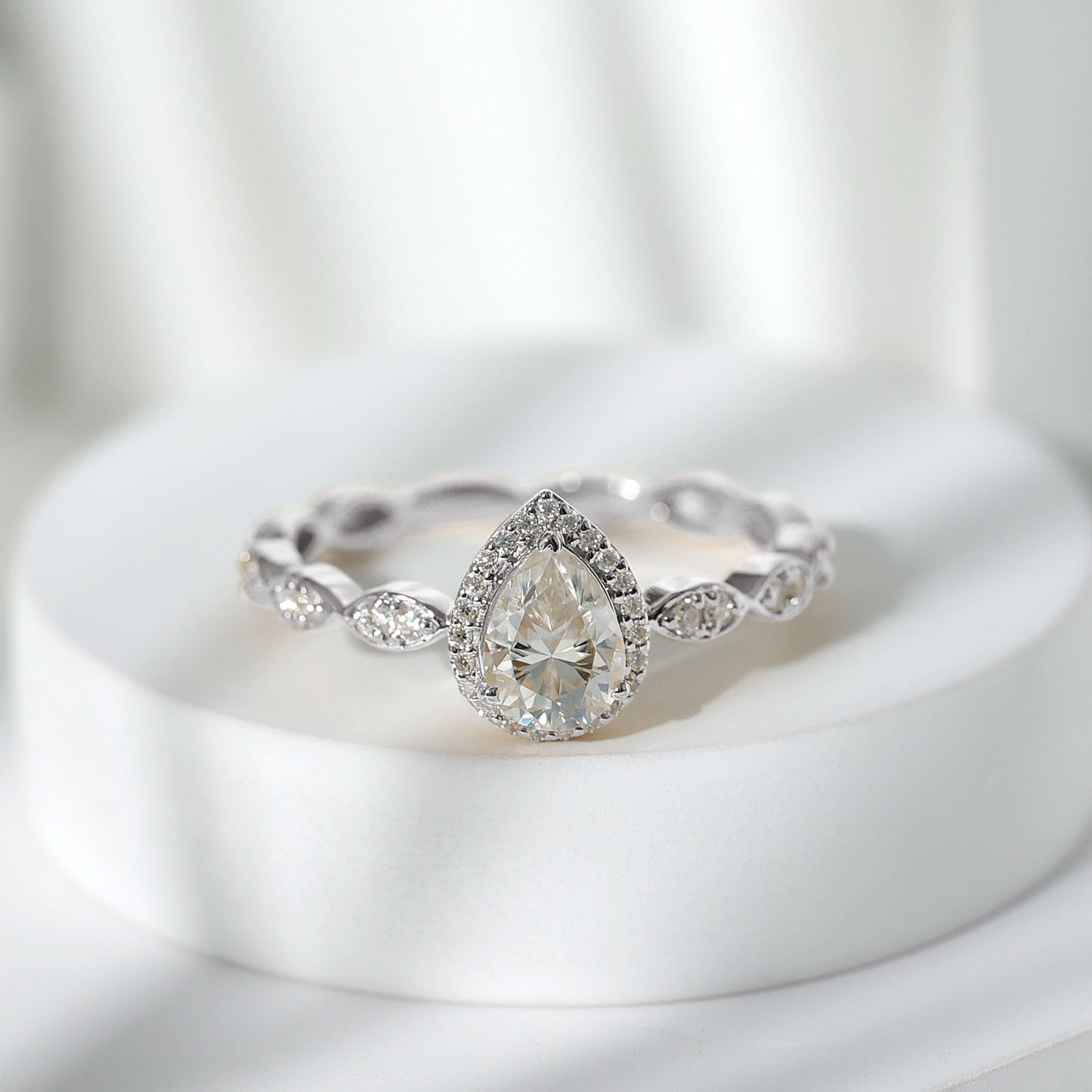 Cubic Zirconia Pear Halo Engagement Ring with Side Stones