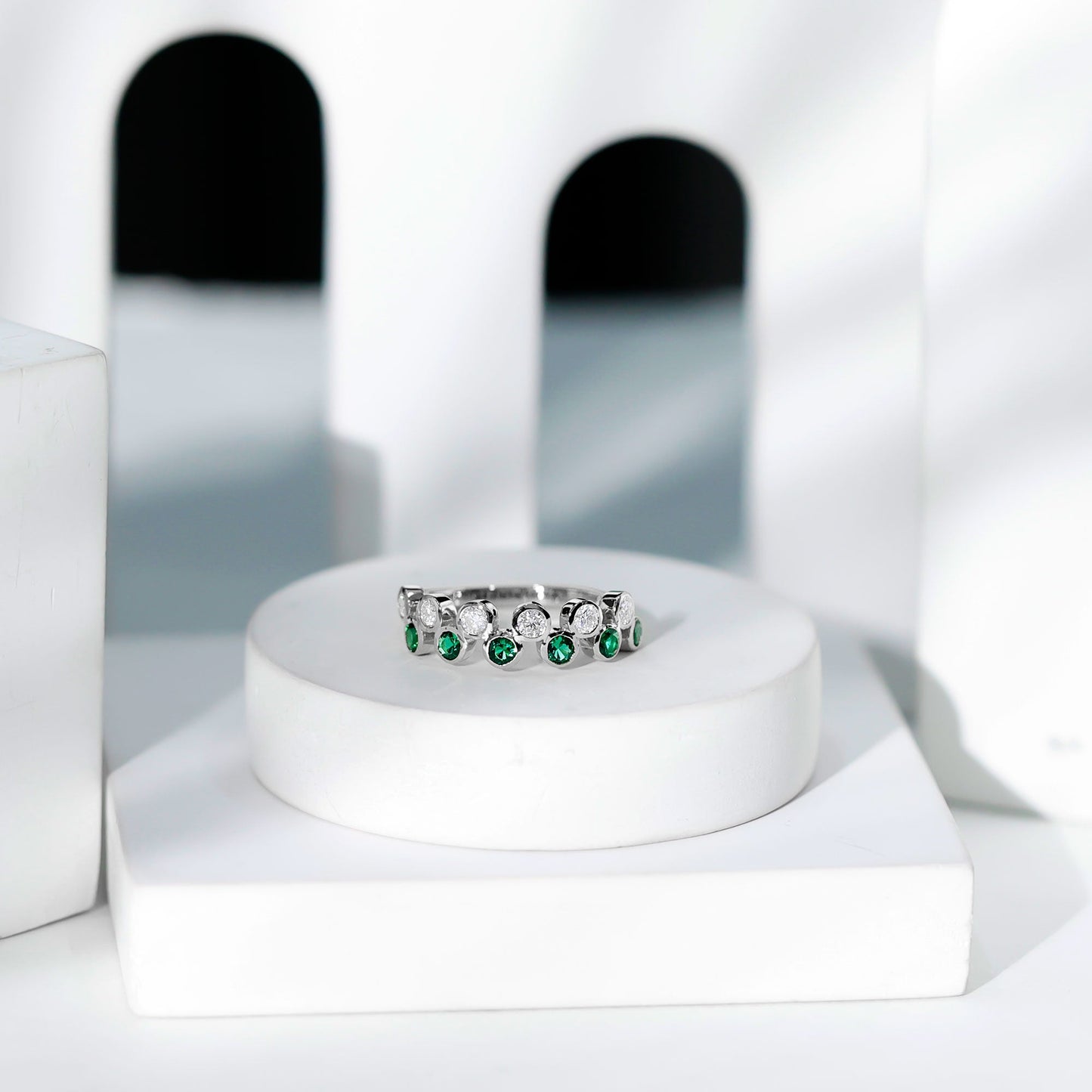 Bezel Set Lab Grown Emerald and Moissanite Half Eternity Ring