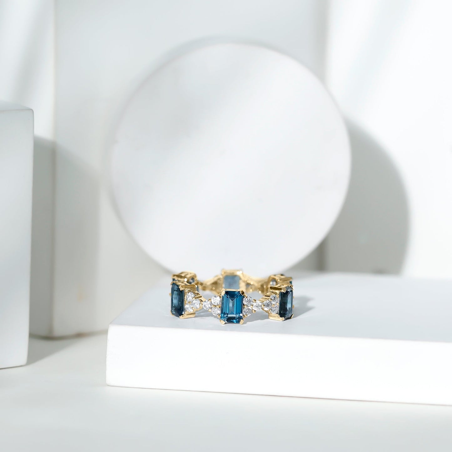 4X6mm Emerald Cut London Blue Topaz Designer Eternity Ring with Moissanite