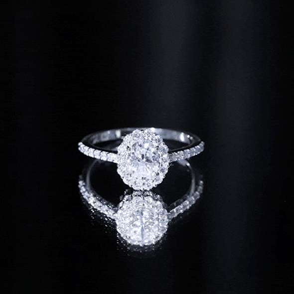 Lab Grown Diamond 6X8MM Oval Halo Engagement Ring With Side Stones
