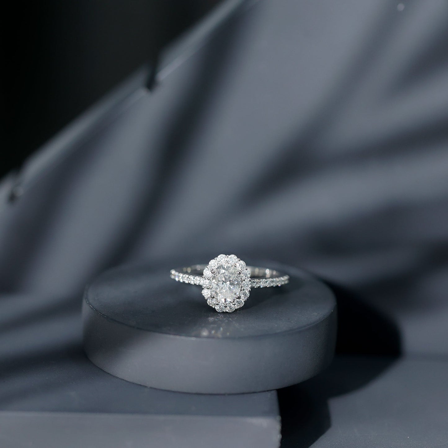 Lab Grown Diamond 6X8MM Oval Halo Engagement Ring With Side Stones