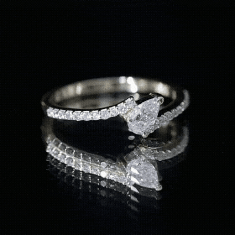 Tilted Pear Shape Simulated Diamond Bypass Promise Ring