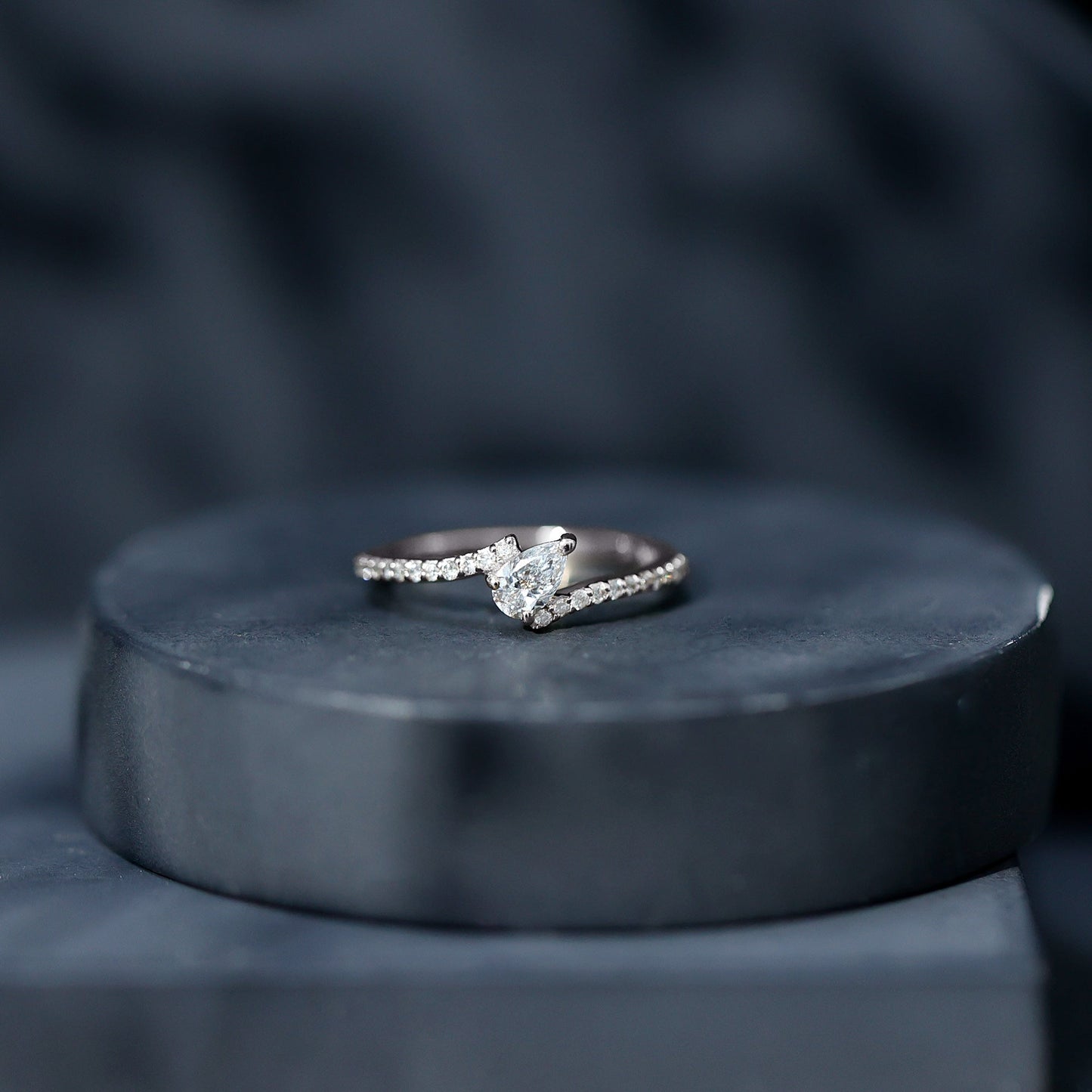 Tilted Pear Shape Simulated Diamond Bypass Promise Ring