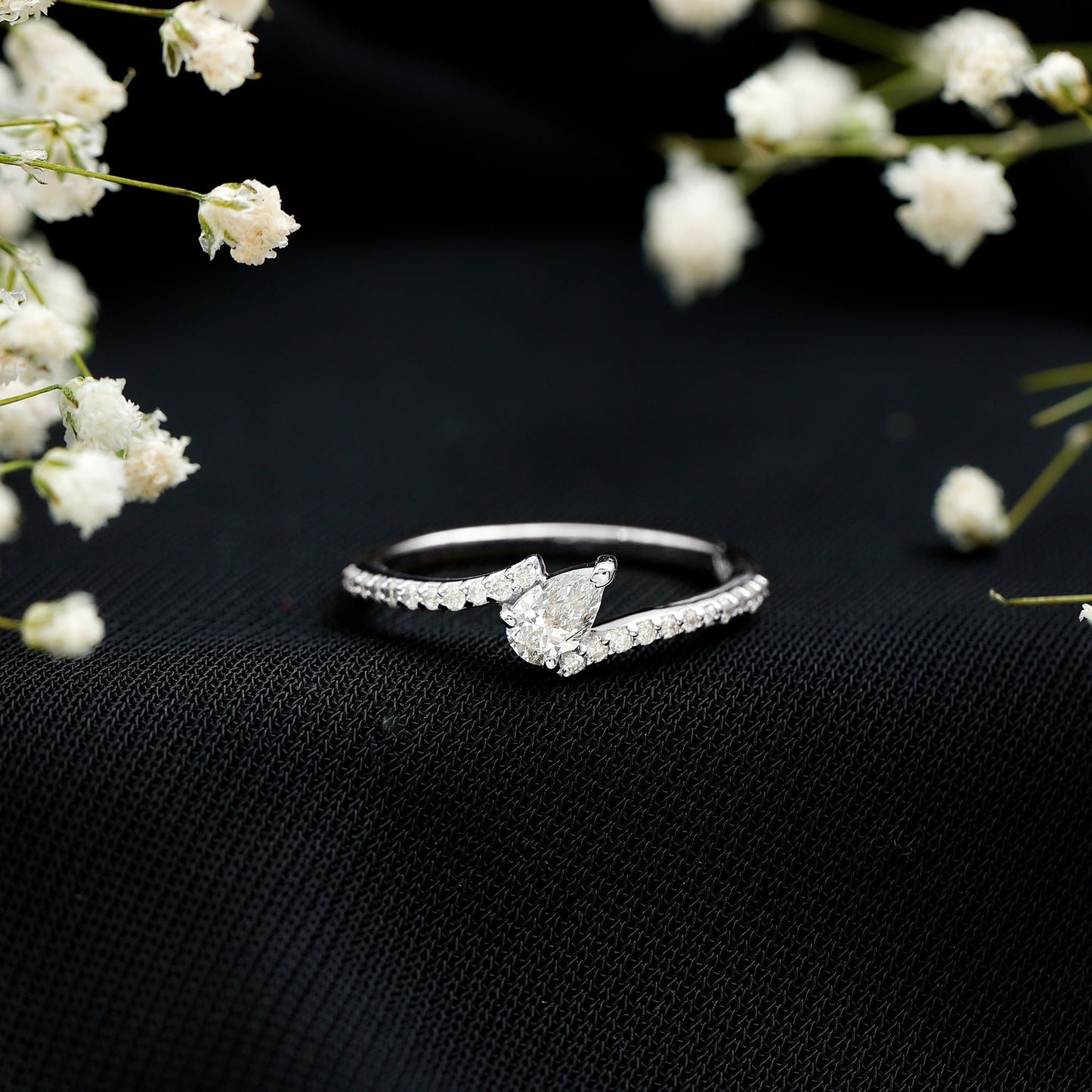 Tilted Pear Shape Simulated Diamond Bypass Promise Ring