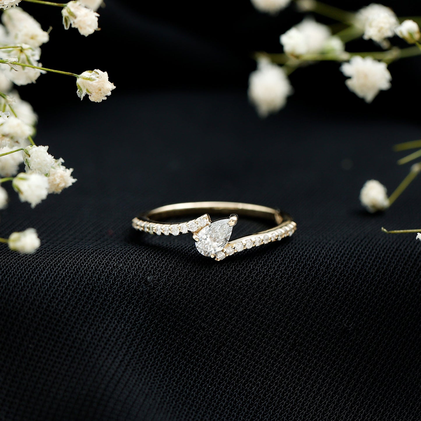 Tilted Pear Shape Simulated Diamond Bypass Promise Ring