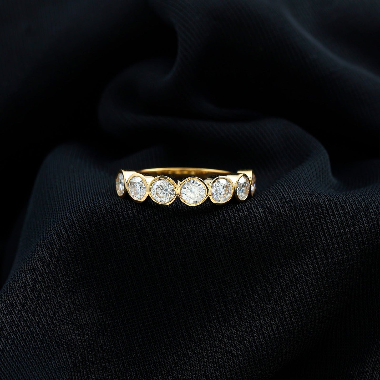 2.2 Carat Round Moissanite Half Eternity Ring in Bezel Setting