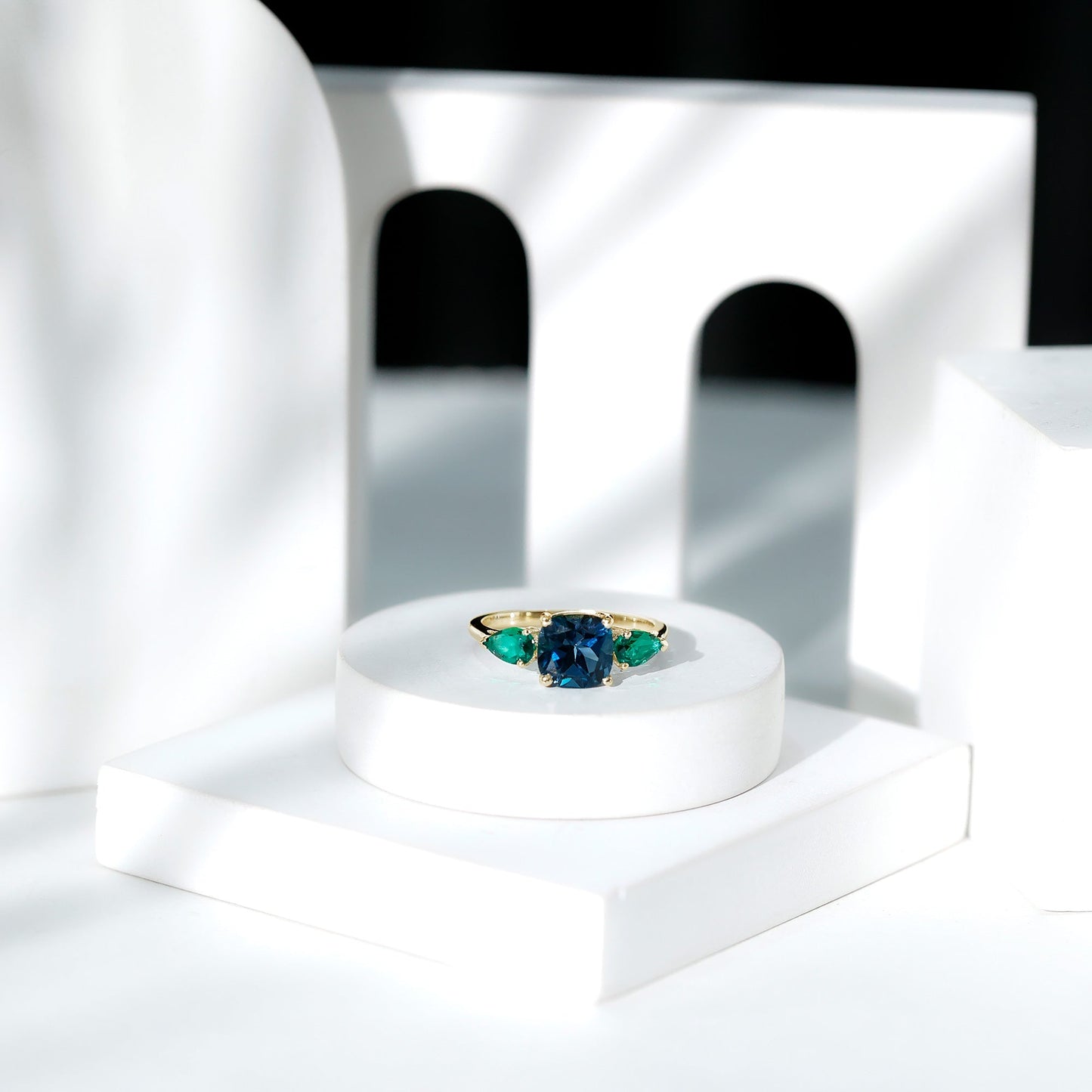 8mm Cushion Shape London Blue Topaz Three Stone Engagement Ring with Lab Emerald