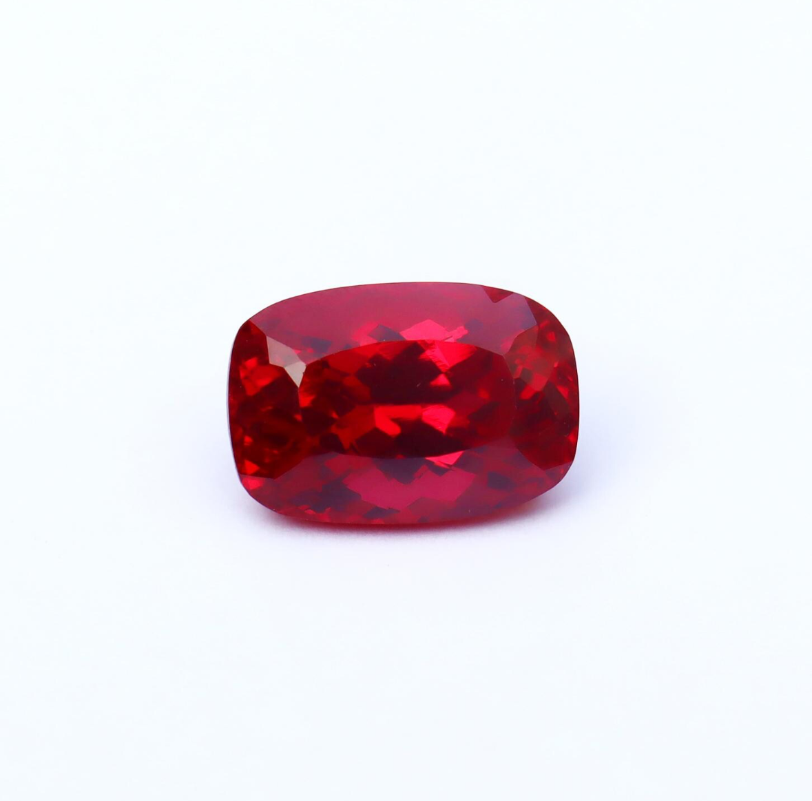 Red gemstone on a white background