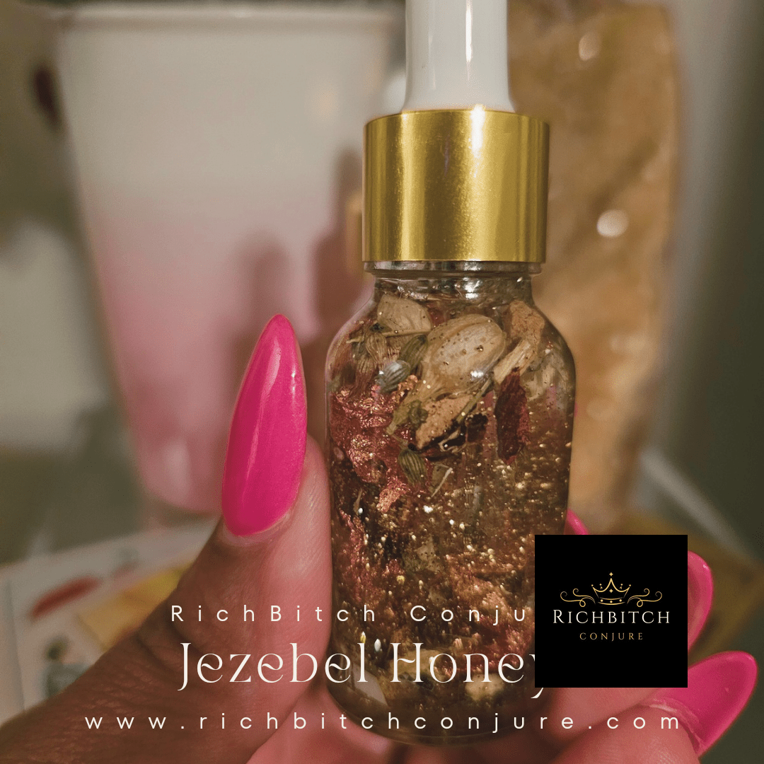 Vial labeled 'Jezebel' Honey' held by a hand with pink nail polish, brand 'RichBitch Conjure' visible. Rich Bitch Conjure's Jezebel Honey Oil