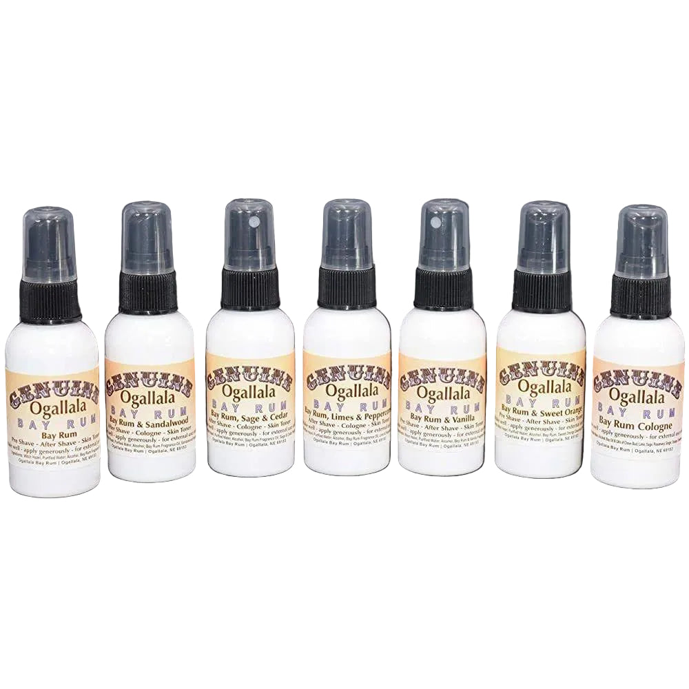 Row of Ogallala Bay Rum cologne bottles on a gray background