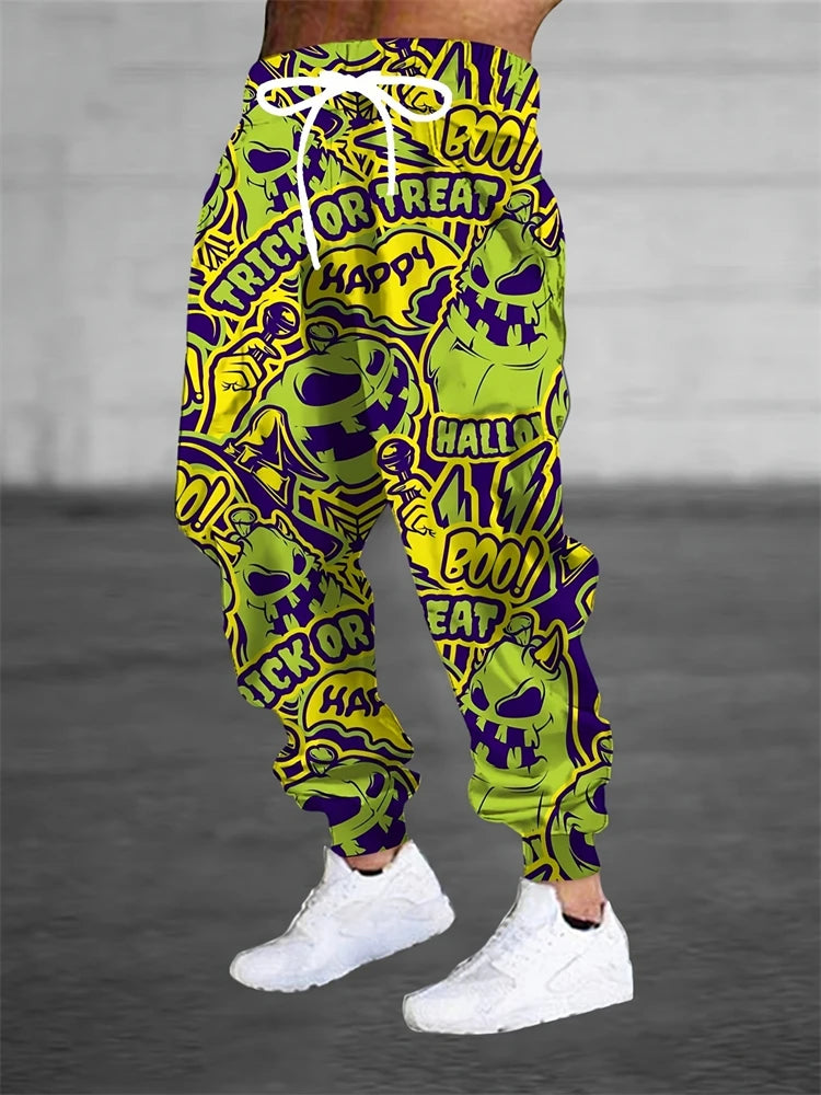 Green and purple Halloween-themed pants with text on a gray background