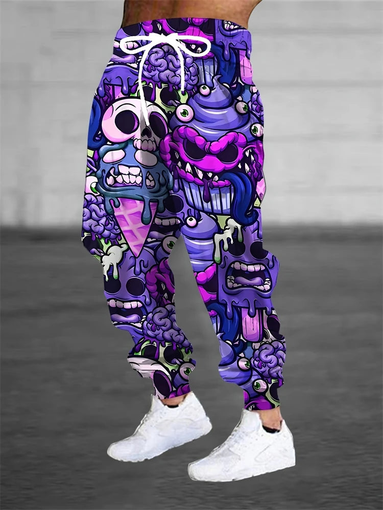 Colorful graphic pants with a abstract design worn by a person on a gray background
