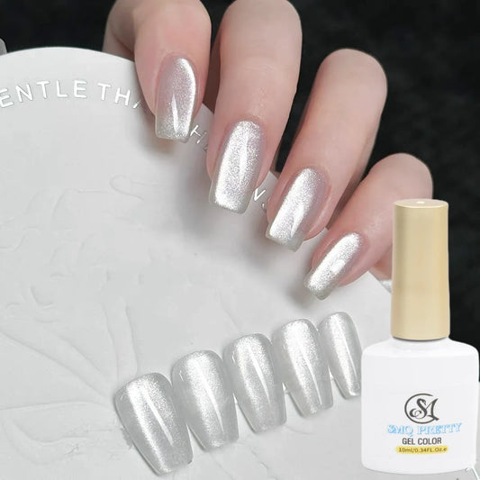 A close-up studio shot featuring a bottle of holographic cat-eye gel nail polish set against a clean white background, surrounded by elegant swatches showcasing a shimmering silver glitter effect.