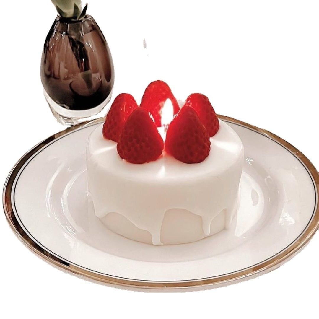 Small white cake with red strawberries on a white plate with a gold rim, next to a glass of dark liquid. Small white cake with red strawberries on a white plate with gold rim, placed on a tablecloth. Small white cake with red strawberries on a white plate with gold rim, placed on a tablecloth. Handmade Strawberry Cake Shaped Candle Soy Wax Aromatherapy