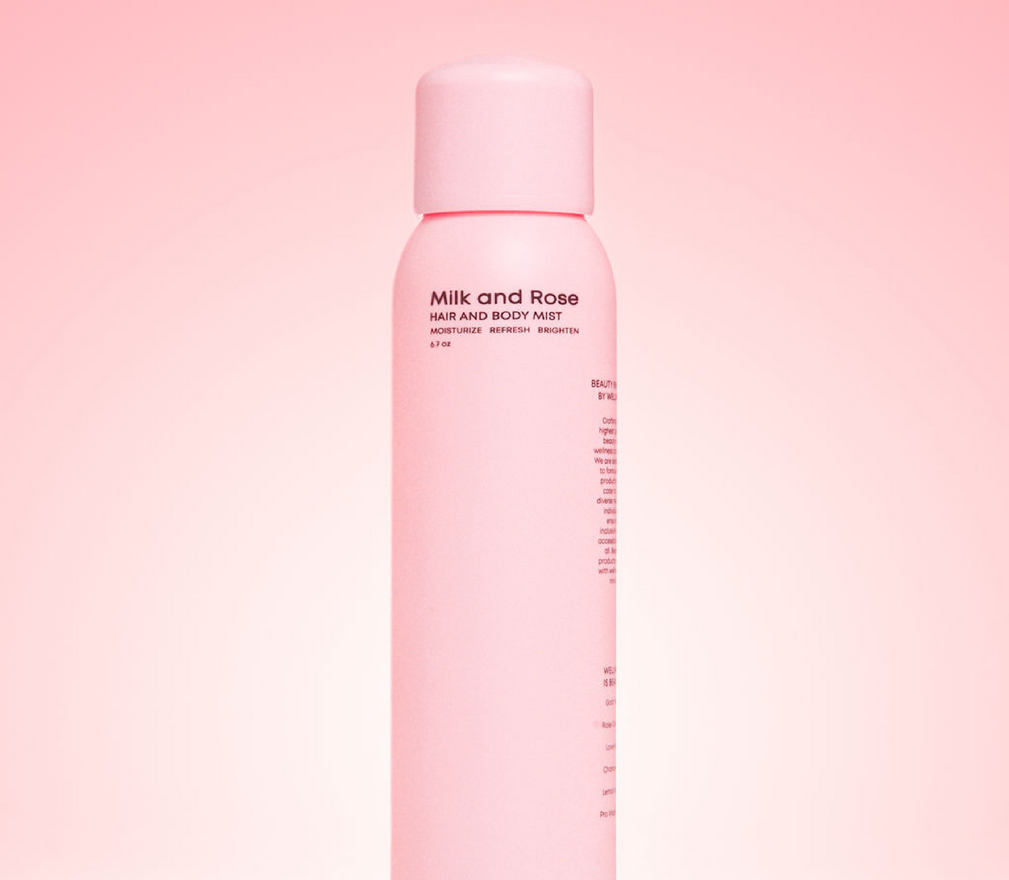 Spice Beauty Milk and Rose Hair and Body Mist bottle on a soft pink background, hydrating body spray for moisturizing, refreshing, and brightening skin and hair.