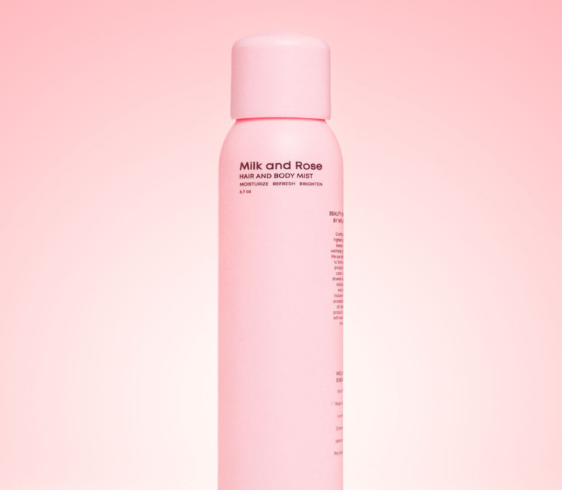 Spice Beauty Milk and Rose Hair and Body Mist bottle on a soft pink background, hydrating body spray for moisturizing, refreshing, and brightening skin and hair.