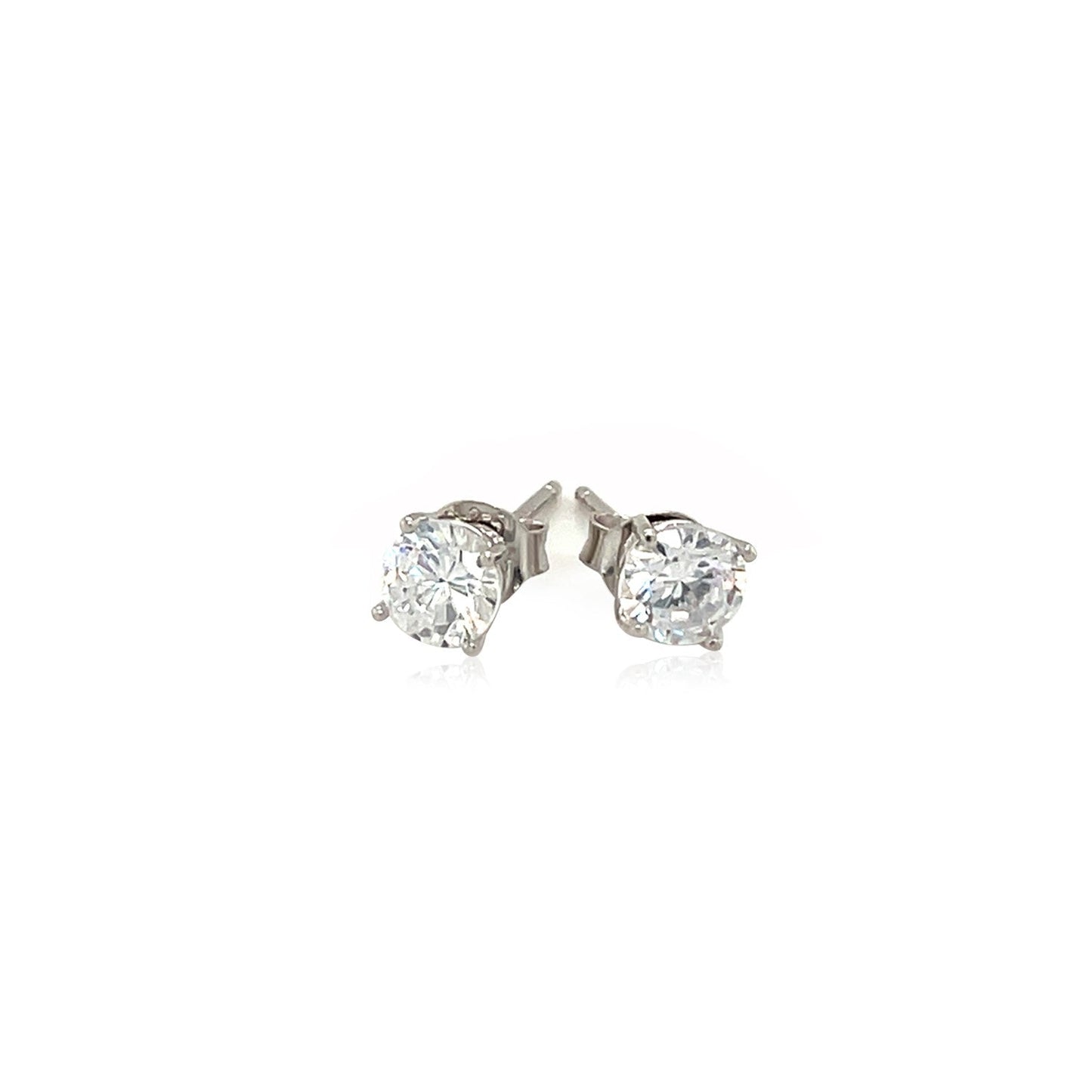 Pair of diamond stud earrings on a white background