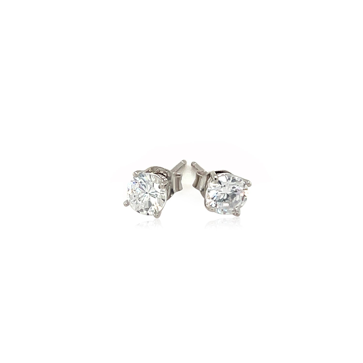 Pair of diamond stud earrings on a white background